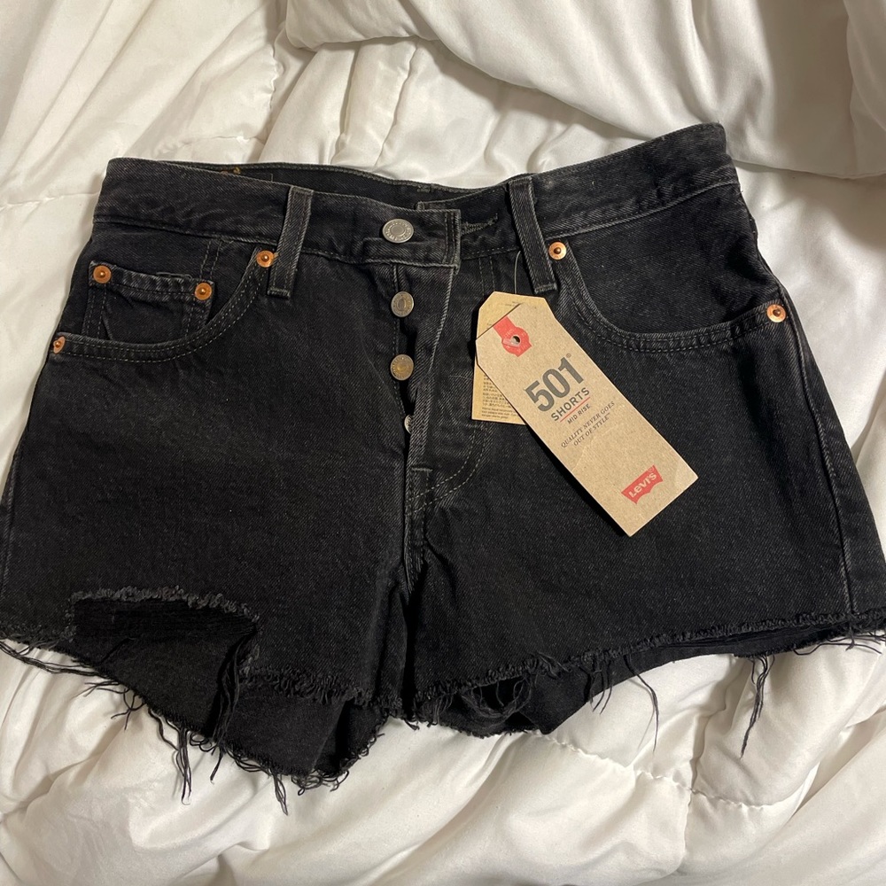 Brand new Levi 501 mid rise distressed shorts size 24